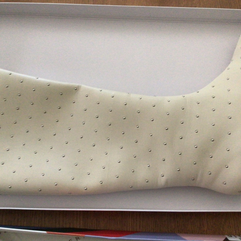 Katy Perry studded knee high boot in vanilla.  NIB.  Size 9.